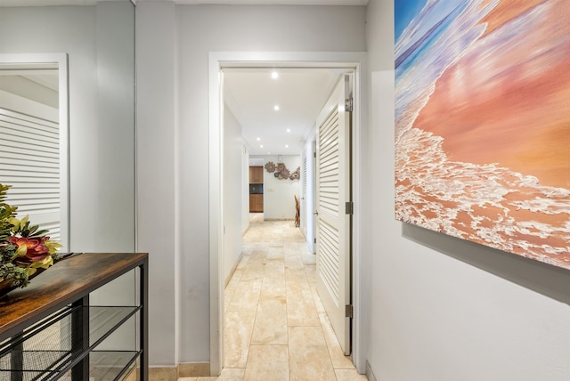 hallway with light wood-type flooring