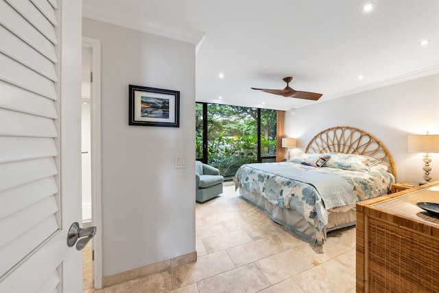 bedroom with ornamental molding, expansive windows, and ceiling fan