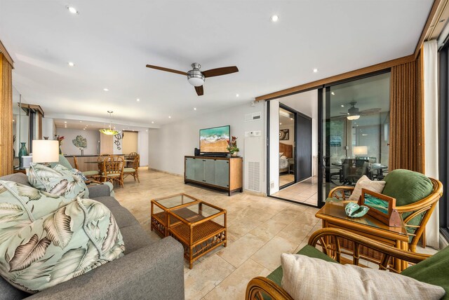 tiled living room featuring ceiling fan