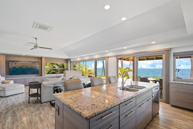 2274 S Kihei Rd, Kihei, HI 96753 - kitchen featuring recessed lighting, open floor plan, a kitchen island with sink, stainless steel dishwasher, and vaulted ceiling