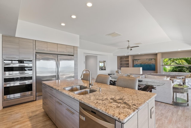 2274 S Kihei Rd, Kihei, HI 96753 - kitchen with appliances with stainless steel finishes, recessed lighting, a center island with sink, modern cabinets, and open floor plan
