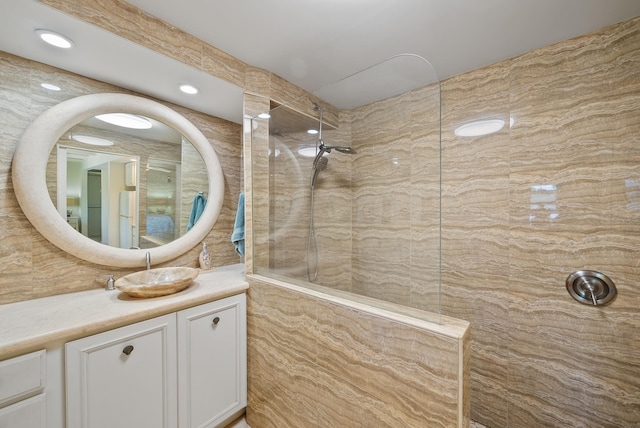 2274 S Kihei Rd, Kihei, HI 96753 - bathroom with a walk in shower, vanity, recessed lighting, and tile walls