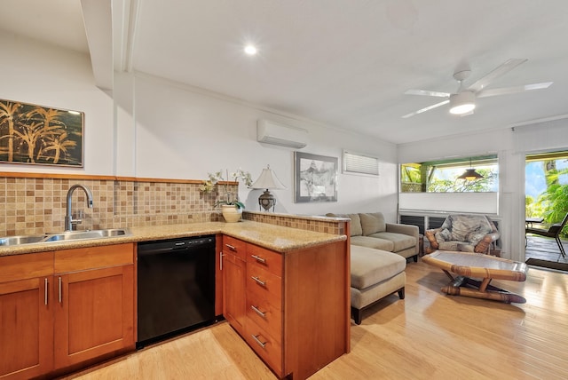 2274 S Kihei Rd, Kihei, HI 96753 - kitchen with black dishwasher, a wall unit AC, a peninsula, backsplash, and brown cabinets