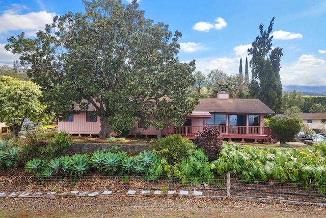 view of front of property with a deck