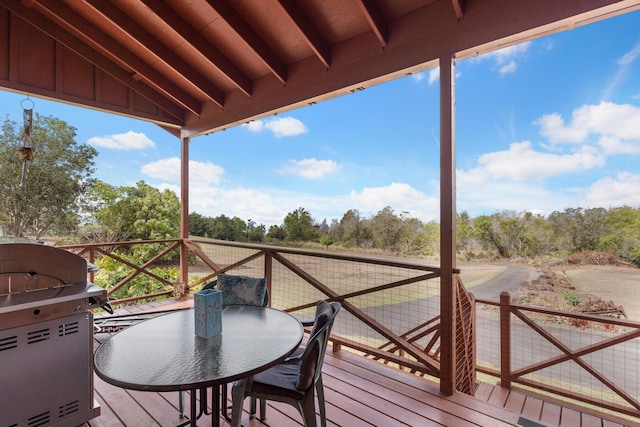 wooden terrace with grilling area