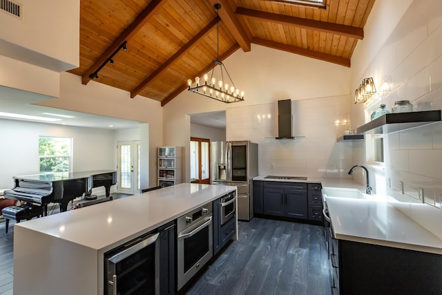 kitchen with beverage cooler, open shelves, stainless steel appliances, visible vents, and wall chimney exhaust hood