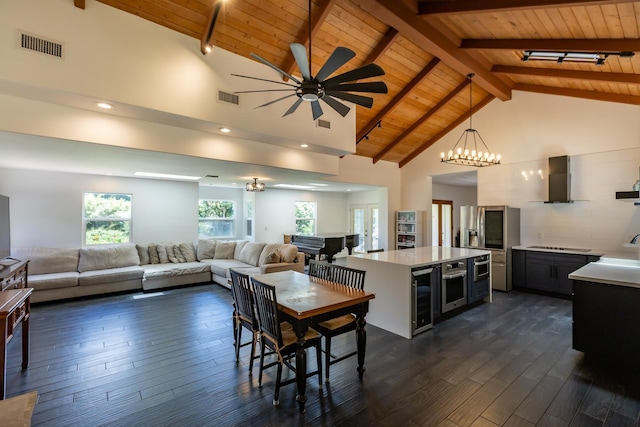 dining space with beverage cooler, visible vents, wooden ceiling, and dark wood-style flooring