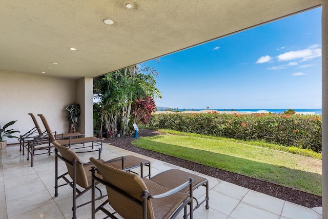 view of patio / terrace featuring a water view