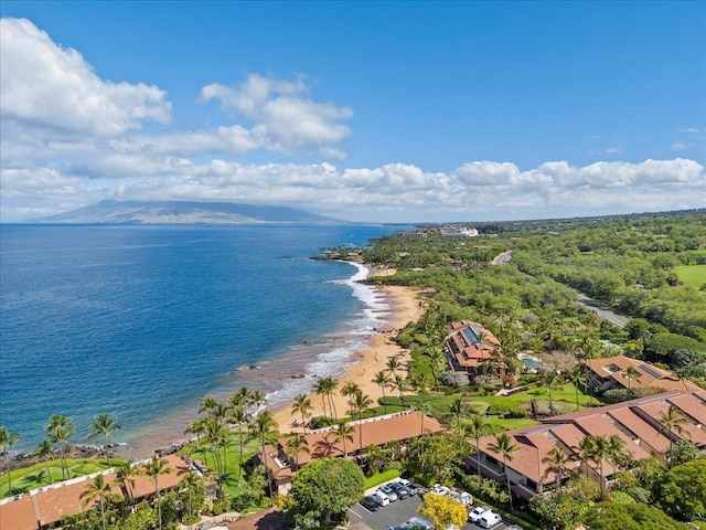 bird's eye view featuring a water and mountain view and a view of the beach