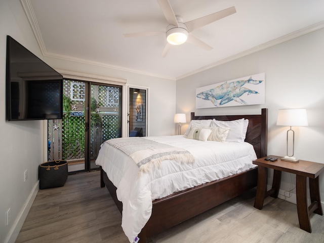 bedroom with ceiling fan, access to exterior, wood-type flooring, and ornamental molding