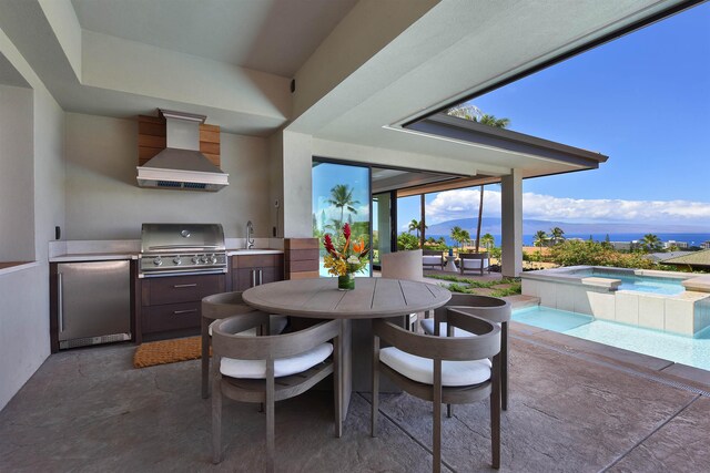 dining area with sink and a mountain view