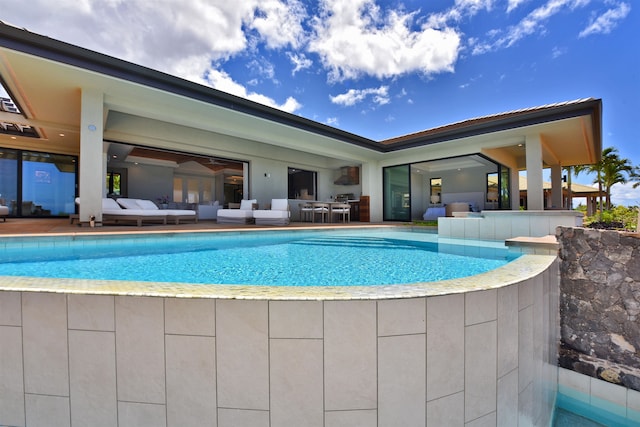 view of swimming pool with a patio area and outdoor lounge area