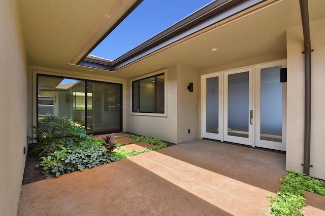 view of patio featuring french doors