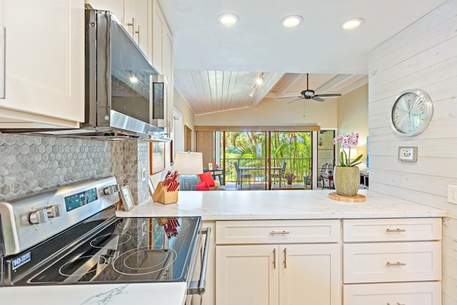 3788 Lower Honoapiilani Rd Unit D101, Lahaina, HI 96761 - kitchen with stainless steel appliances, decorative backsplash, white cabinetry, recessed lighting, and light stone countertops