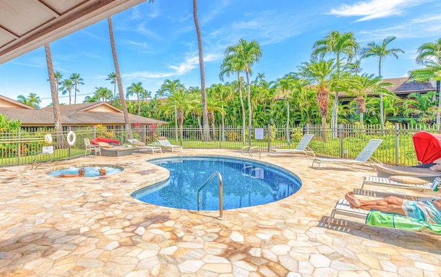 3788 Lower Honoapiilani Rd Unit D101, Lahaina, HI 96761 - community pool with a fenced backyard, a patio area, and a community hot tub
