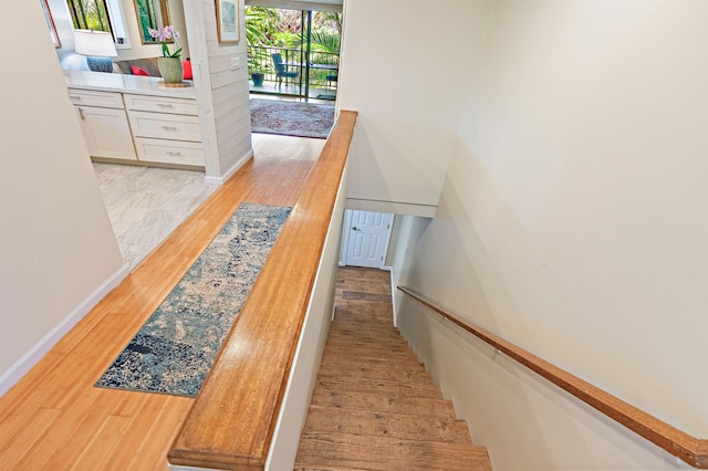 3788 Lower Honoapiilani Rd Unit D101, Lahaina, HI 96761 - stairway featuring wood finished floors and baseboards