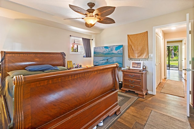 3788 Lower Honoapiilani Rd Unit D101, Lahaina, HI 96761 - bedroom with wood finished floors and ceiling fan