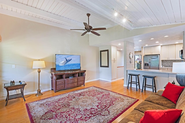 3788 Lower Honoapiilani Rd Unit D101, Lahaina, HI 96761 - living area with wooden ceiling, ceiling fan, and light wood-type flooring