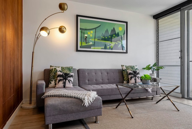 sitting room featuring hardwood / wood-style floors