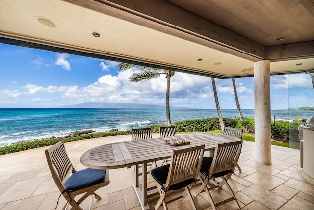 view of patio / terrace with a water view