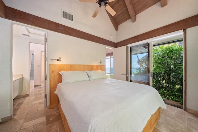 bedroom featuring access to exterior, ensuite bath, ceiling fan, high vaulted ceiling, and beamed ceiling