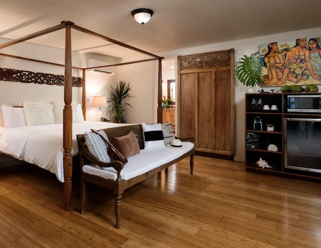 bedroom featuring hardwood / wood-style flooring