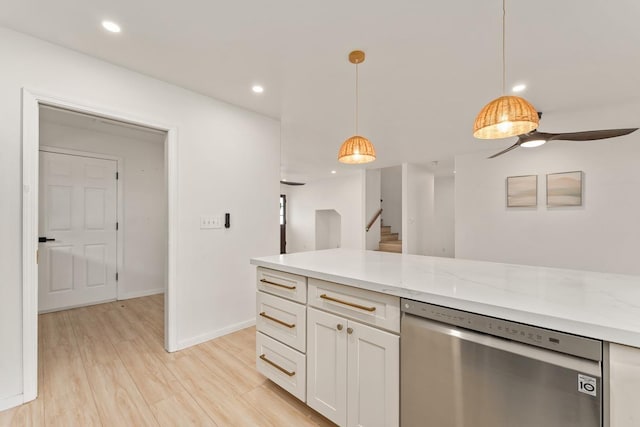 1395 Hiahia St, Wailuku, HI 96793 - kitchen with stainless steel dishwasher, white cabinetry, decorative light fixtures, light wood-style flooring, and a ceiling fan