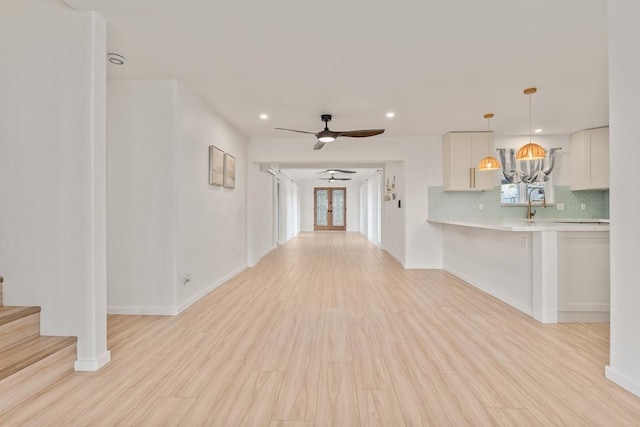 1395 Hiahia St, Wailuku, HI 96793 - hall with recessed lighting, light wood finished floors, baseboards, and stairs