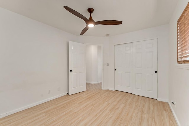 1395 Hiahia St, Wailuku, HI 96793 - unfurnished bedroom with wood finished floors, baseboards, and a closet