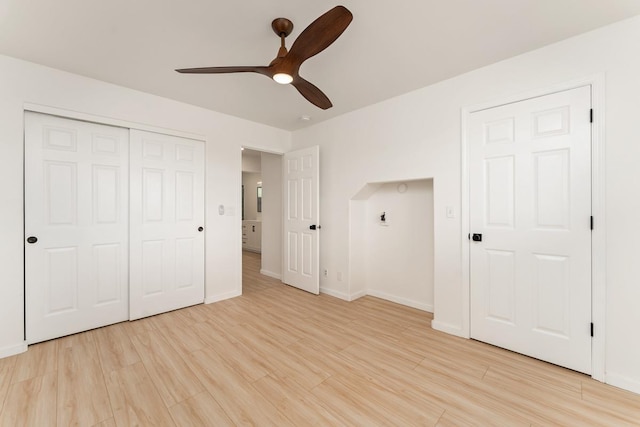 1395 Hiahia St, Wailuku, HI 96793 - unfurnished bedroom featuring light wood-style flooring, baseboards, and a closet