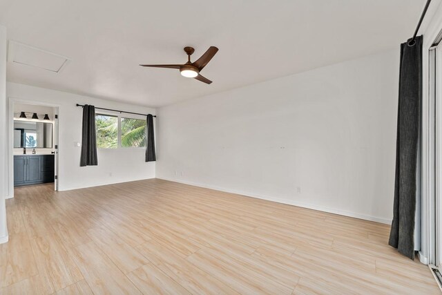 1395 Hiahia St, Wailuku, HI 96793 - empty room with ceiling fan, light wood-type flooring, baseboards, and attic access