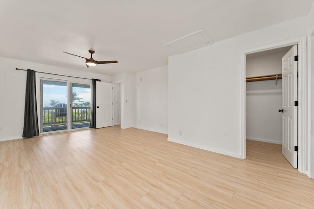 1395 Hiahia St, Wailuku, HI 96793 - unfurnished room featuring attic access, light wood-type flooring, baseboards, and a ceiling fan