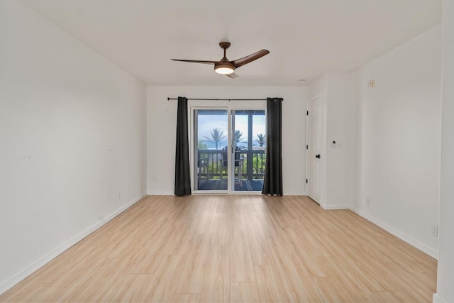 1395 Hiahia St, Wailuku, HI 96793 - spare room with a ceiling fan, baseboards, and wood finished floors