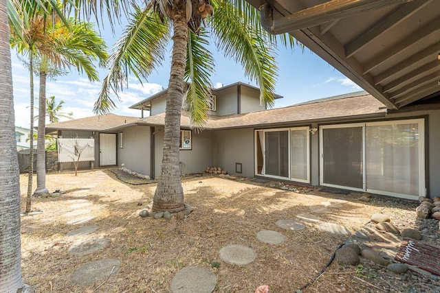 1395 Hiahia St, Wailuku, HI 96793 - rear view of property with stucco siding