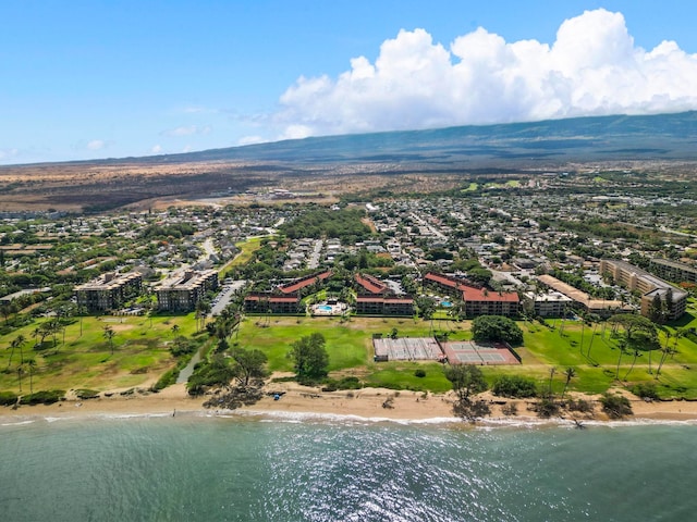 bird's eye view with a beach view and a water view