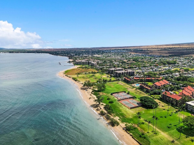 birds eye view of property featuring a view of the beach and a water view