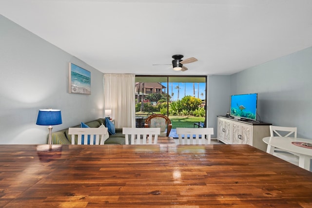 dining space featuring ceiling fan