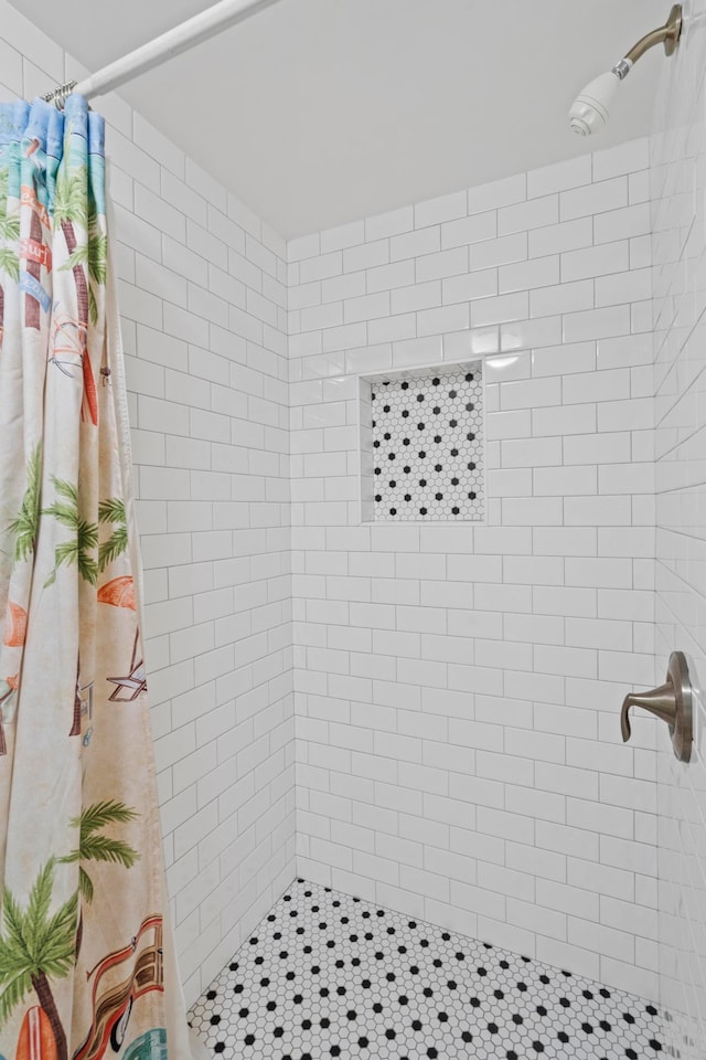 bathroom with curtained shower