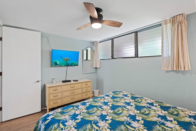 bedroom featuring ceiling fan and light wood-type flooring