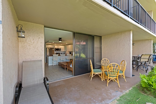 view of patio / terrace featuring a balcony