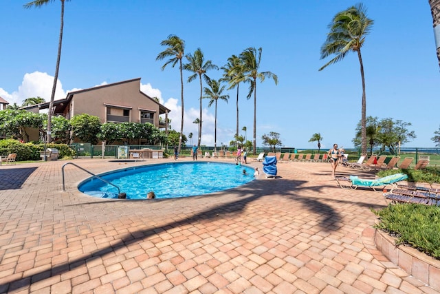 view of swimming pool featuring a patio area