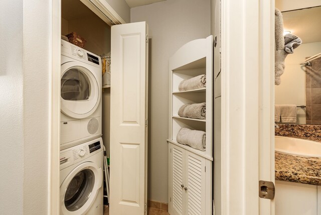 bedroom with carpet flooring, ceiling fan, lofted ceiling, and multiple closets