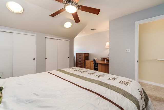 interior space featuring vaulted ceiling and carpet floors