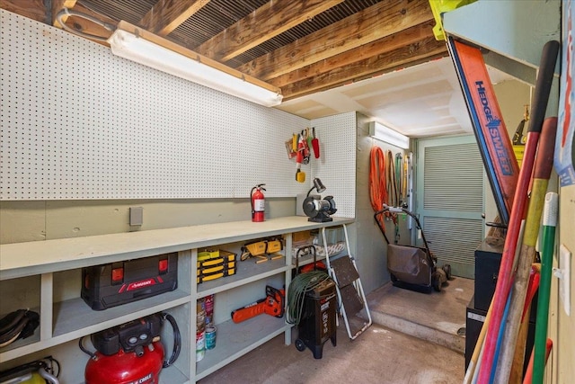 basement with a workshop area
