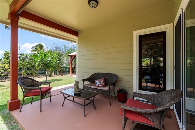 view of patio featuring fence