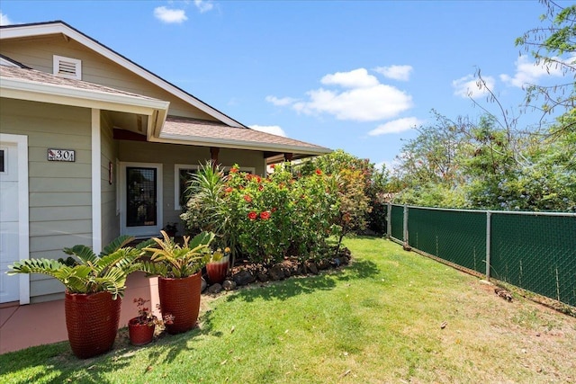 view of yard with fence