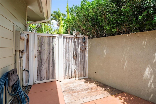 exterior space with a gate
