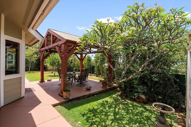 view of yard with a patio, a gazebo, and a fenced backyard
