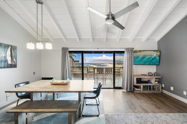 dining space featuring vaulted ceiling with beams, hardwood / wood-style floors, and ceiling fan