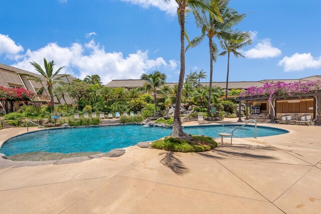 view of swimming pool featuring a patio